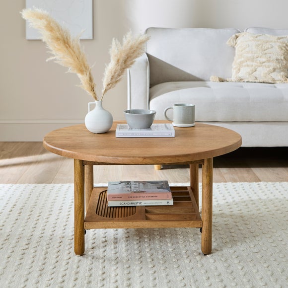 Click to view product details and reviews for Khari Round Coffee Table Midtone Mango Wood.