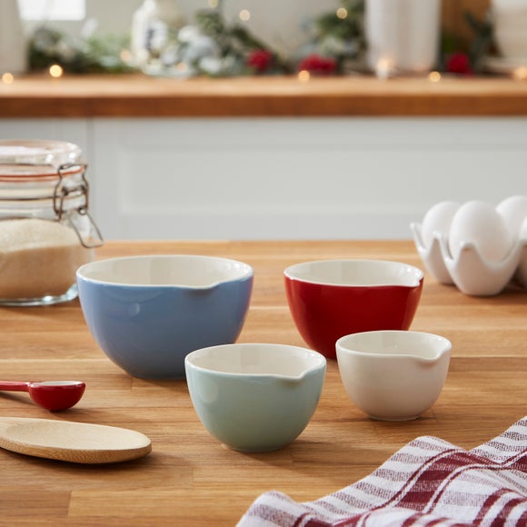 Click to view product details and reviews for Set Of 4 Ceramic Measuring Cups.