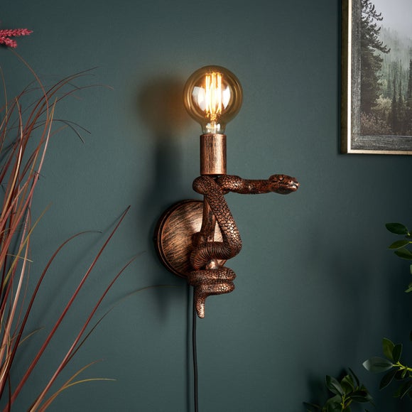 Click to view product details and reviews for Snake Plug In Wall Light.