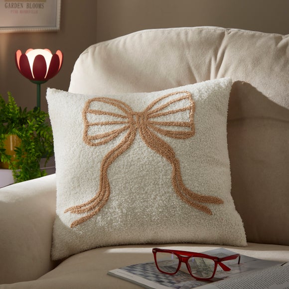 Click to view product details and reviews for Bow Boucle Square Cushion. Click to view product details and reviews for Bow Boucle Square Cushion.