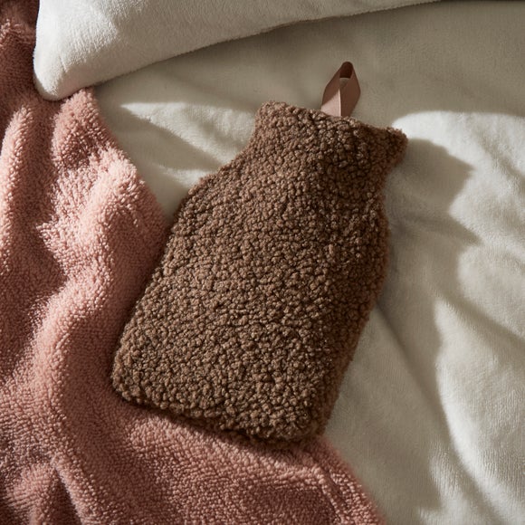 Click to view product details and reviews for Boucle Fawn Mini Hot Water Bottle.