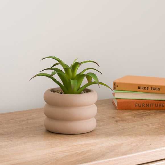 Click to view product details and reviews for Artificial Succulent In Ridged Taupe Plant Pot.