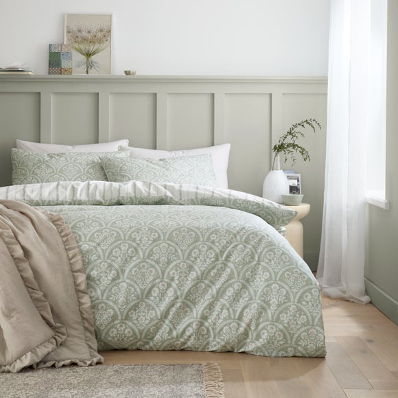 Click to view product details and reviews for Bianca Scallop Floral Cotton Reversible Duvet Cover Pillowcase Set.