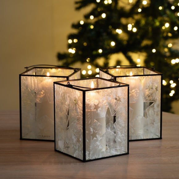 Photo of set of 3 star etched glass lantern candle holders