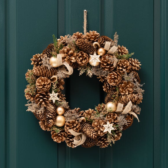 Click to view product details and reviews for Artificial Wreath With Wooden Stars Pine Cones Gold Ornaments.