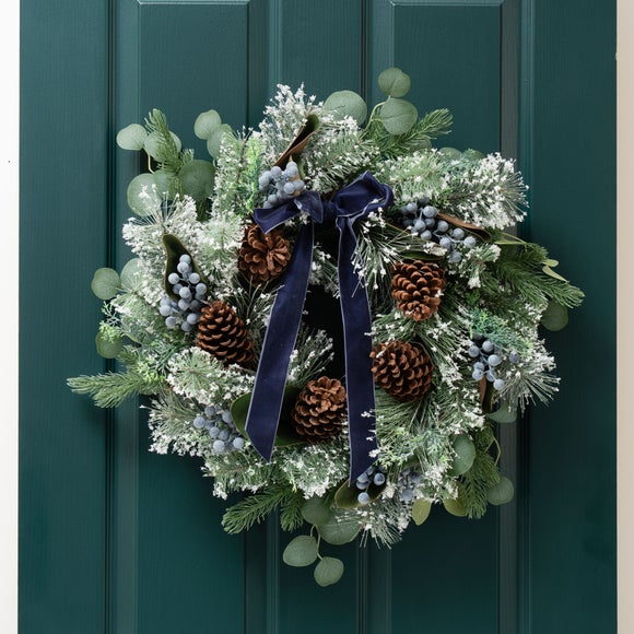 Click to view product details and reviews for Artificial Frosted Wreath With Pinecones Navy Velvet Bow.