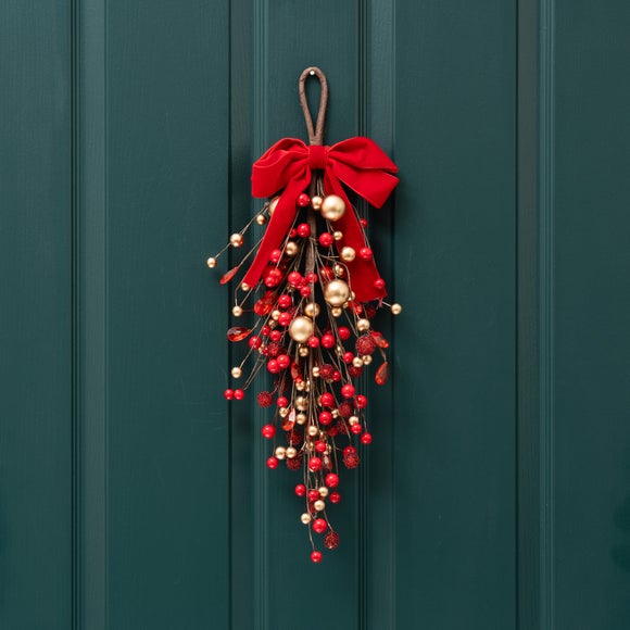 Click to view product details and reviews for Artificial Bauble Berry Swag With Red Bow. Click to view product details and reviews for Artificial Bauble Berry Swag With Red Bow.