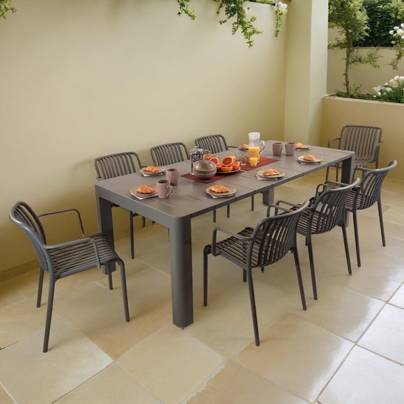 Click to view product details and reviews for Modura Henrik Rectangular Dining Table With 8 Alma Armchairs.