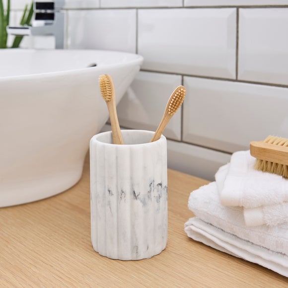 Click to view product details and reviews for Marble Effect Ribbed Resin Toothbrush Holder.