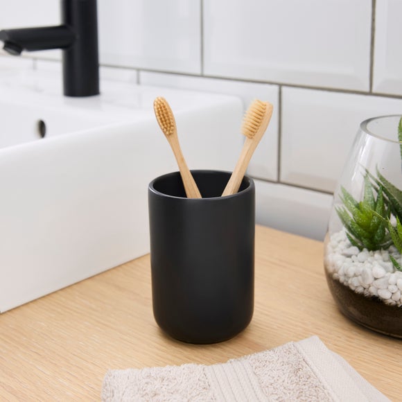 Click to view product details and reviews for Matte Black Toothbrush Holder.