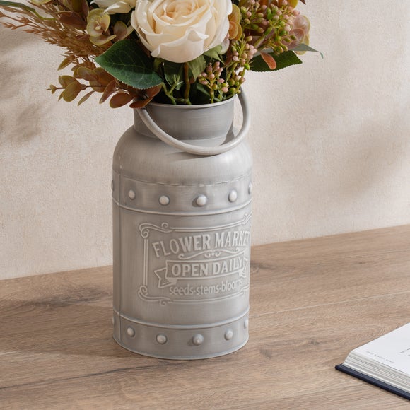 Click to view product details and reviews for Metal Churn Vase.