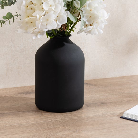 Photo of iron bottle vase