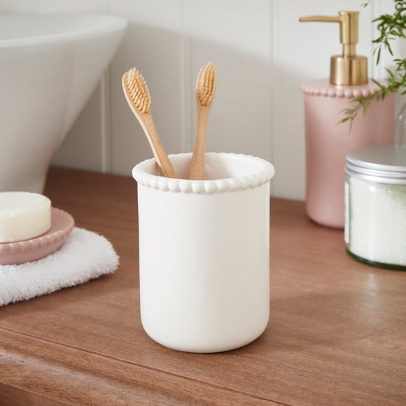 Click to view product details and reviews for Bobbin Toothbrush Holder.