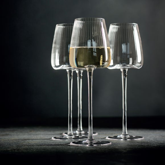 Click to view product details and reviews for Brooke Set Of 4 Ribbed Concave Wine Glasses.