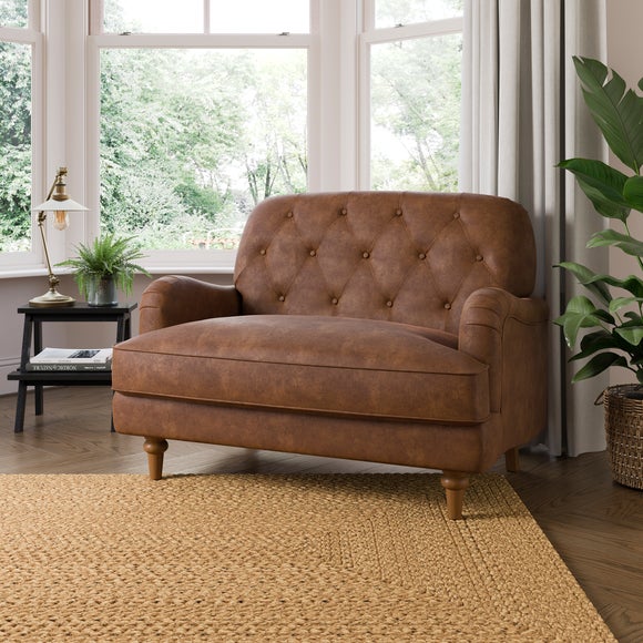 Beatrice II Buttoned Faux Leather Snuggle Chair