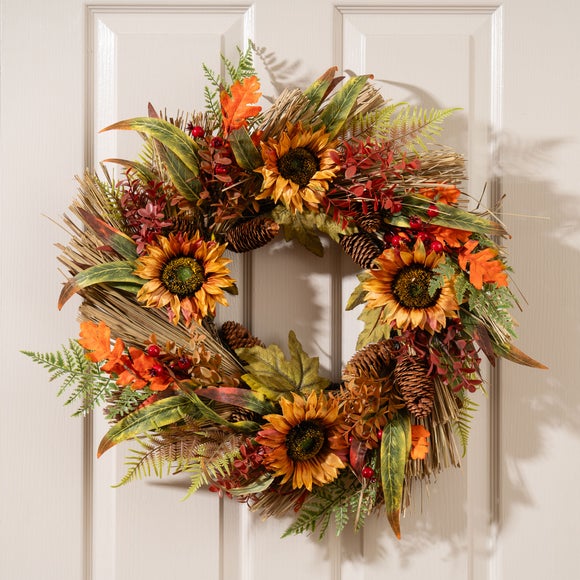 Click to view product details and reviews for Artificial Autumnal Sunflower Wreath. Click to view product details and reviews for Artificial Autumnal Sunflower Wreath.