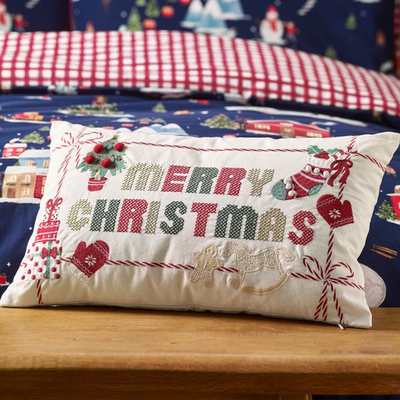 Click to view product details and reviews for Catherine Lansfield Merry Christmas Cross Stitch Rectangular Cushion.