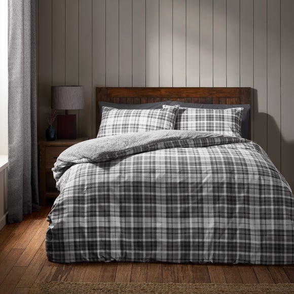 Click to view product details and reviews for Catherine Lansfield Cosy Sherpa Check Polycotton Duvet Cover Pillowcase Set.