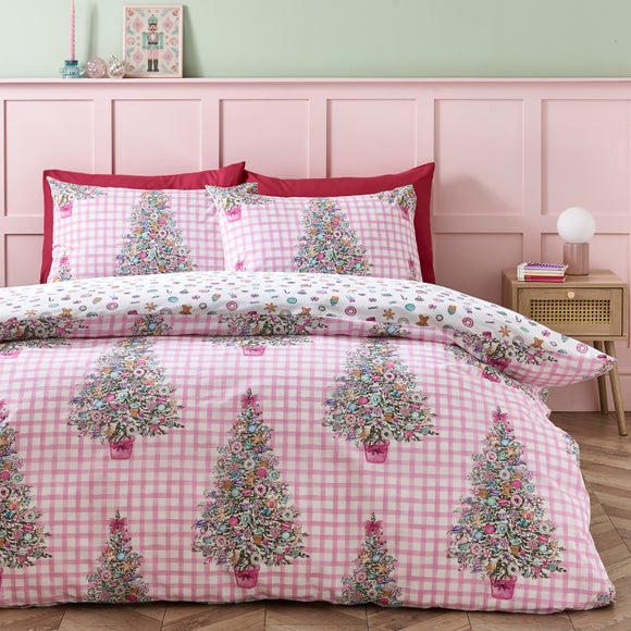 Click to view product details and reviews for Catherine Lansfield Christmas Sweets And Treats Polycotton Duvet Cover Pillowcase Set.