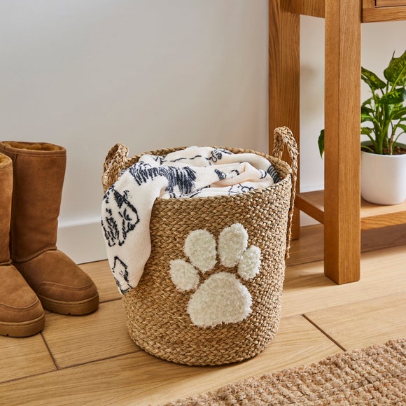 Click to view product details and reviews for Paw Print Tapered Seagrass Storage Basket.