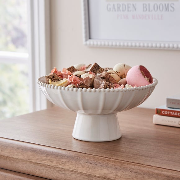 Click to view product details and reviews for Ceramic Ribbed Bowl With Beaded Edge.