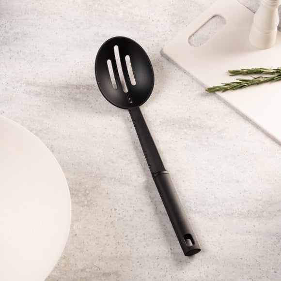 Click to view product details and reviews for Handy Kitchen Slotted Spoon With Herb Stripper.