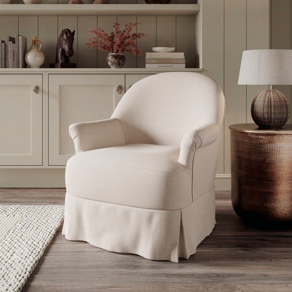 Click to view product details and reviews for Petit Faux Linen Skirted Occasional Armchair.