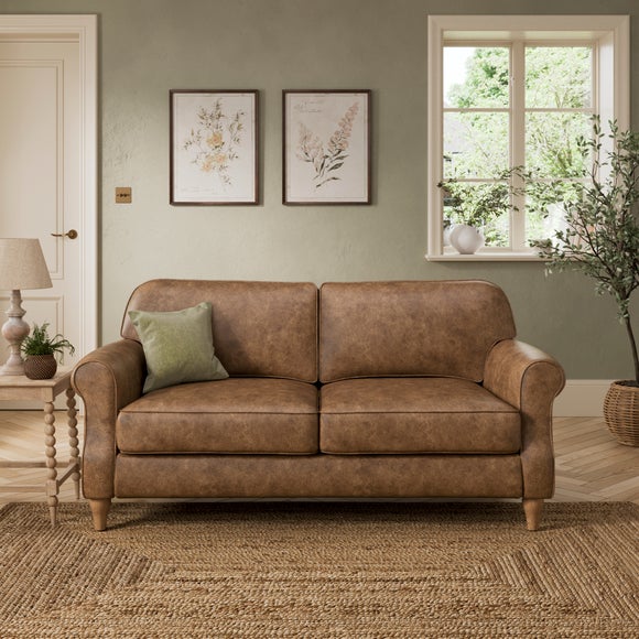 Click to view product details and reviews for Millie Soft Faux Leather 2 Seater Sofa.