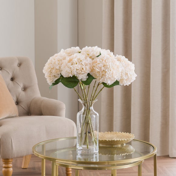 Click to view product details and reviews for Artificial White Hydrangea Stem. Click to view product details and reviews for Artificial White Hydrangea Stem.