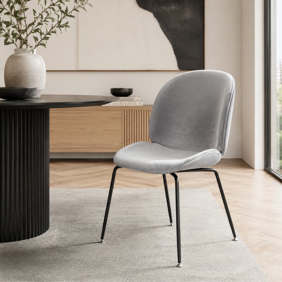 View Fusion Living Luxurious Velvet Dining Chair With Black Metal Legs View Fusion Living Luxurious Velvet Dining Chair With Black Metal Legs