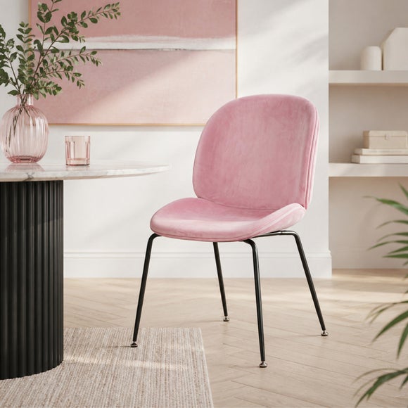 Click to view product details and reviews for Fusion Living Luxurious Velvet Dining Chair With Black Metal Legs.