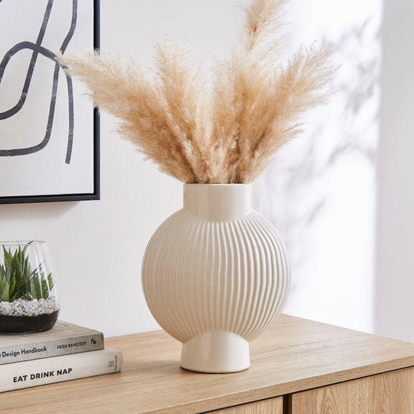 Click to view product details and reviews for Textured Ribbed Round Ceramic Vase. Click to view product details and reviews for Textured Ribbed Round Ceramic Vase.