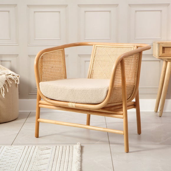 Click to view product details and reviews for Desser Seoul Rattan Chair With Boucle Cushion.