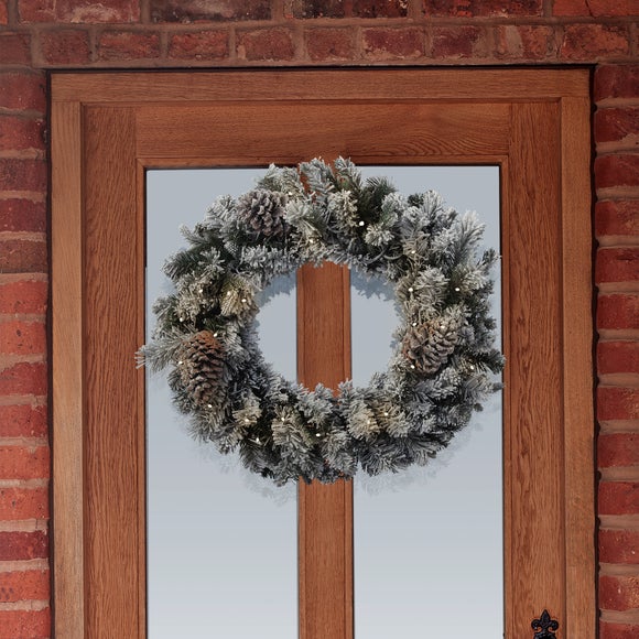 Click to view product details and reviews for Frosted Winterfold Light Up Wreath.
