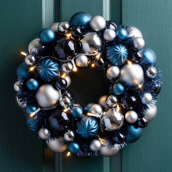 Click to view product details and reviews for 33cm Artificial Pre Lit Navy And Grey Bauble Wreath.
