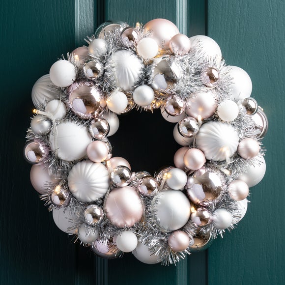 Click to view product details and reviews for 33cm Artificial Pre Lit Champagne And Silver Bauble Wreath.