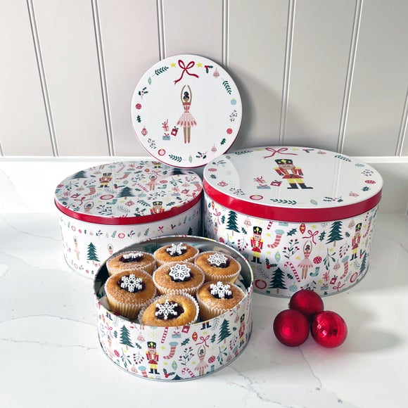 Click to view product details and reviews for Dexam Set Of 3 Nutcracker Round Cake Tins.