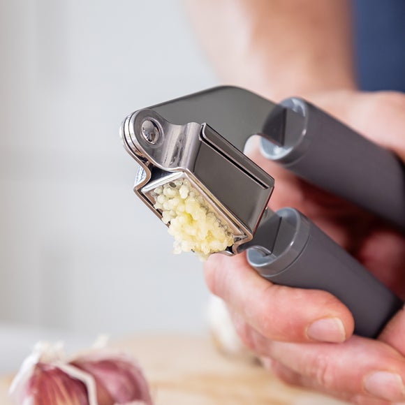 Click to view product details and reviews for Kitchenaid Core Garlic Press.