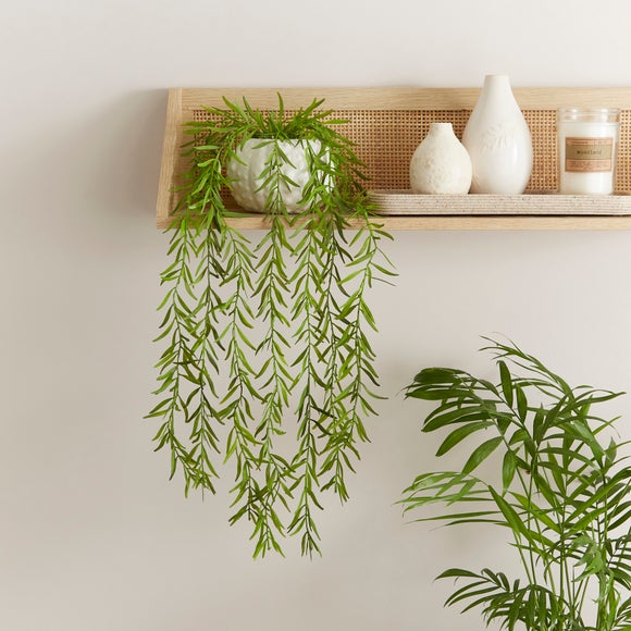 Click to view product details and reviews for Artificial Trailing Plant In White Rounded Ceramic Plant Pot.