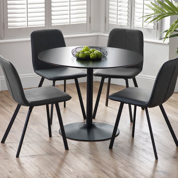 Click to view product details and reviews for Return Nero 4 Seater Round Dining Table 100cm. Click to view product details and reviews for Return Nero 4 Seater Round Dining Table 100cm.