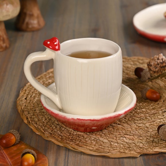 Click to view product details and reviews for Country Living Toadstool Mug Saucer.