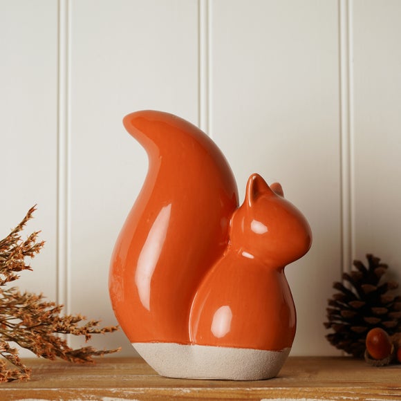 Click to view product details and reviews for Country Living Orange Ceramic Squirrel Ornament. Click to view product details and reviews for Country Living Orange Ceramic Squirrel Ornament.