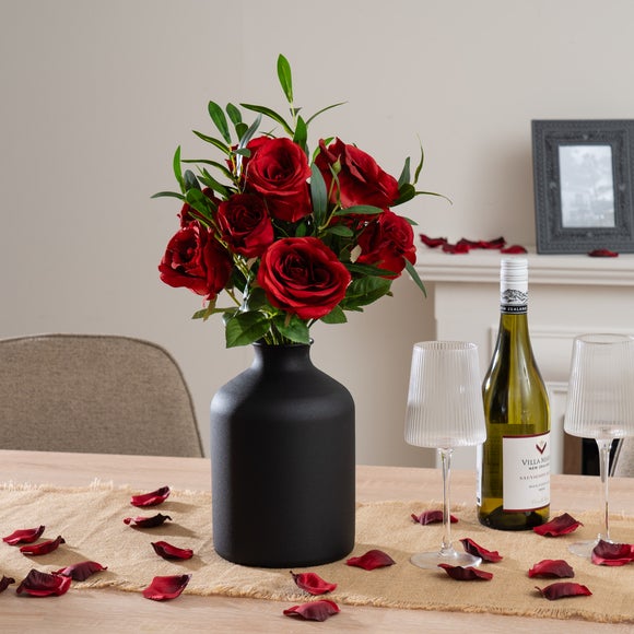 Click to view product details and reviews for Artificial Red Rose And Foliage Bouquet.