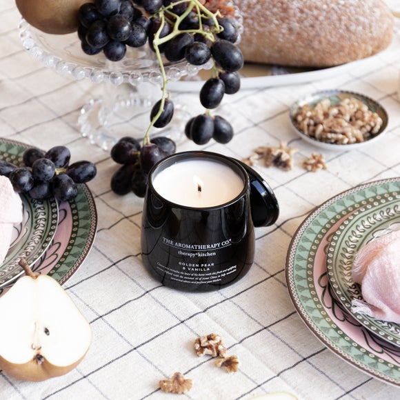 Click to view product details and reviews for The Aromatherapy Co Therapy Kitchen Golden Pear Vanilla Candle.
