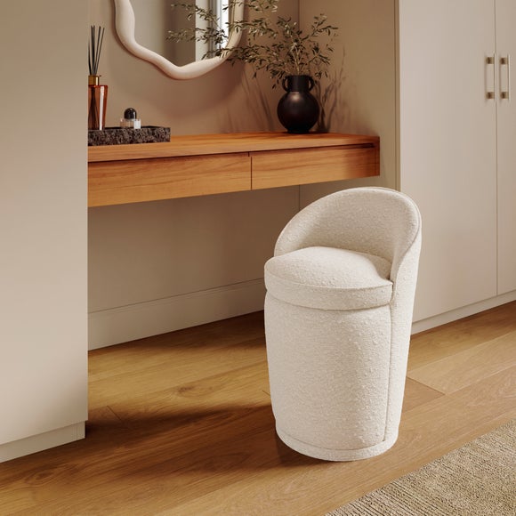 Click to view product details and reviews for Estelle Boucle Swivel Storage Stool.