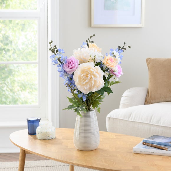 Click to view product details and reviews for Easter Pastel Artificial Bouquet. Click to view product details and reviews for Easter Pastel Artificial Bouquet.