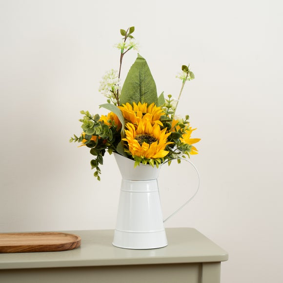 View Artificial Sunflowers In White Metal Jug View Artificial Sunflowers In White Metal Jug