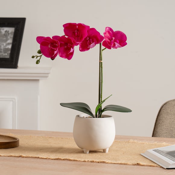 Click to view product details and reviews for Artificial Pink Orchid In Cement Pot.