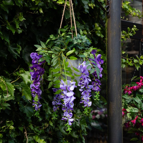 Click to view product details and reviews for Artificial Hanging Wisteria And Ivy In Plant Pot.