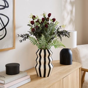 Artificial Deep Burgundy Floral Arrangement In Striped Angular Vase